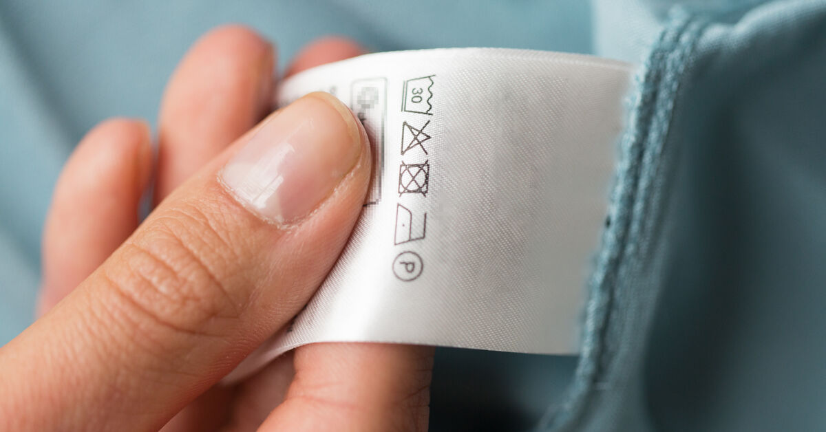 Clothing care label before treating glue stains.