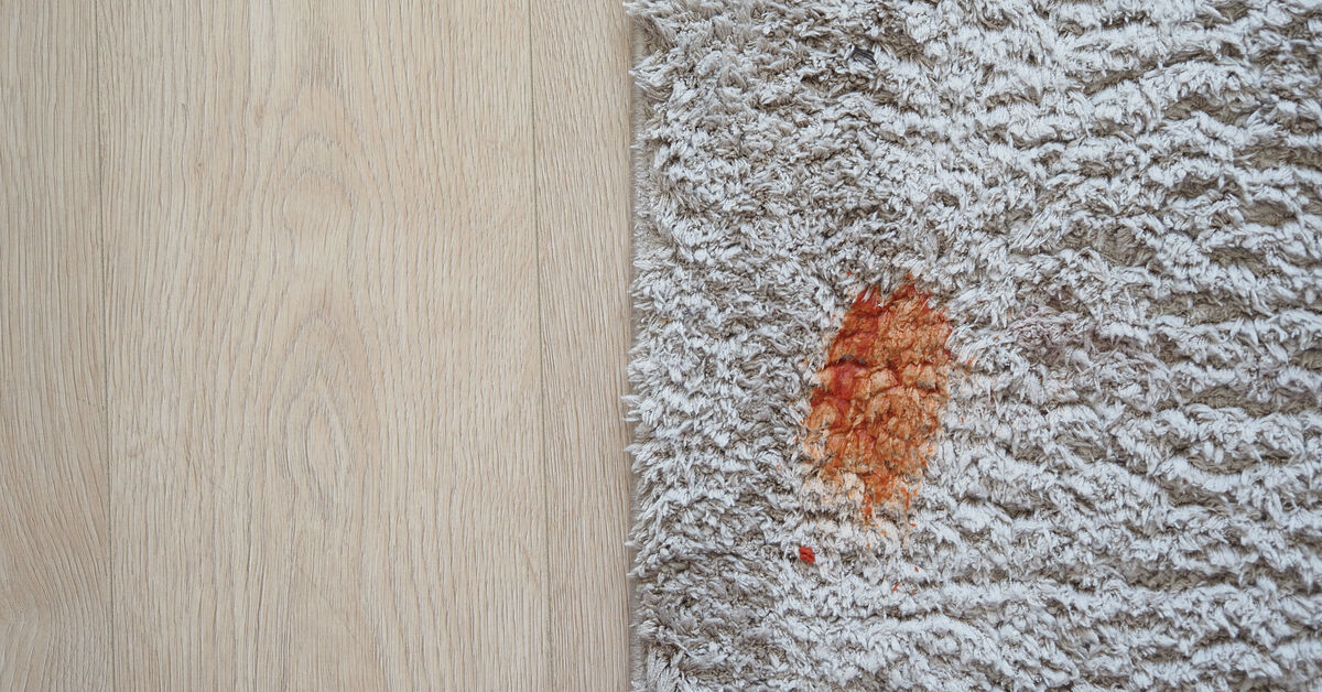 Red wine stain on a rug.