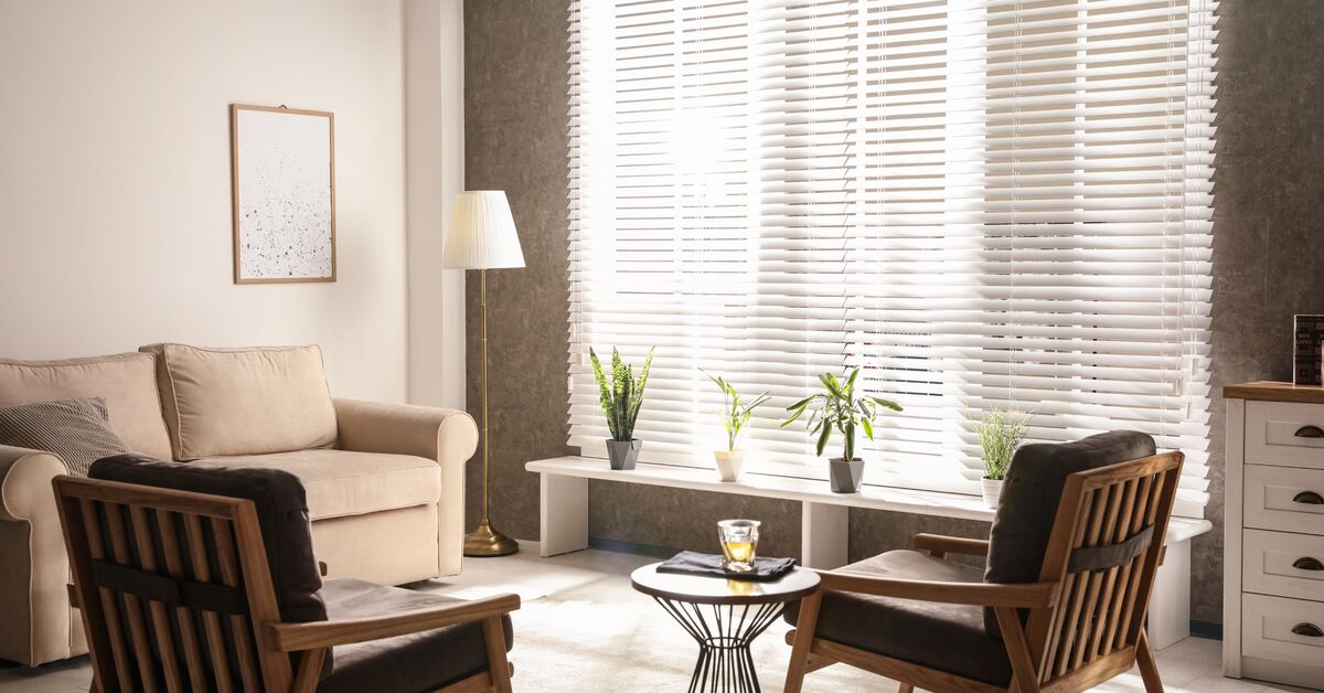 Room window with blinds installed.