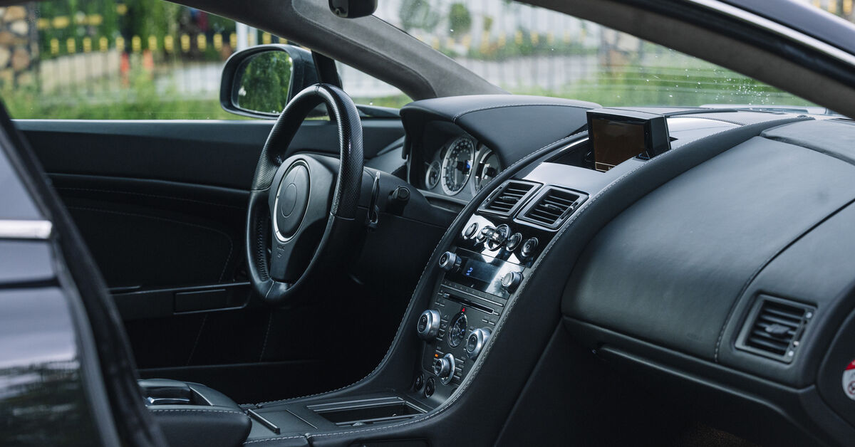 Clean car interior airing out with doors open